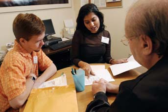 Photo of law students working with at the Elder Law Clinic.