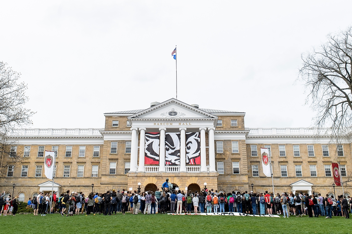 Students, faculty, staff and other supporters gather in front of Bascom Hall for a protest against racism on April 21, 2016. (Photo by Bryce Richter)