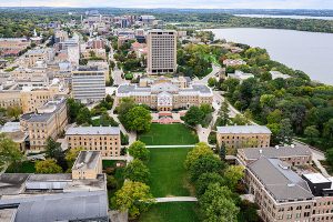 Central UW–Madison campus is pictured in an aerial photograph taken from a helicopter looking west over Bascom Hill.